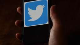 In this photo illustration, a Twitter logo is displayed on a mobile phone on May 27, 2020, in Arlington, Virginia. - US President Donald Trump threatened Wednesday to shutter social media platforms after Twitter for the first time acted against his false tweets, prompting the enraged Republican to double down on unsubstantiated claims and conspiracy theories. Twitter tagged two of Trump's tweets in which he claimed that more mail-in voting would lead to what he called a "Rigged Election" this November. (Photo by Olivier DOULIERY / AFP) (Photo by OLIVIER DOULIERY/AFP via Getty Images)