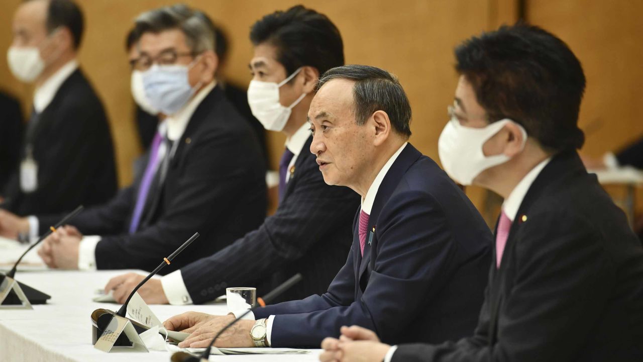 Japanese Prime Minister Yoshihide Suga, second from right, speaks during a meeting of the coronavirus infection control headquarters at his office in Tokyo on Friday, January 22.