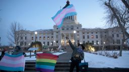 A group of LGBTQ advocates gathered outside the South Dakota Capitol in Pierre on Tuesday, Jan. 26, 2021, to protest a bill that would have banned people from updating the sex on their birth certificates. (AP Photo/Stephen Groves)