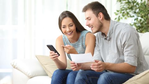 underscored couple using budgeting app