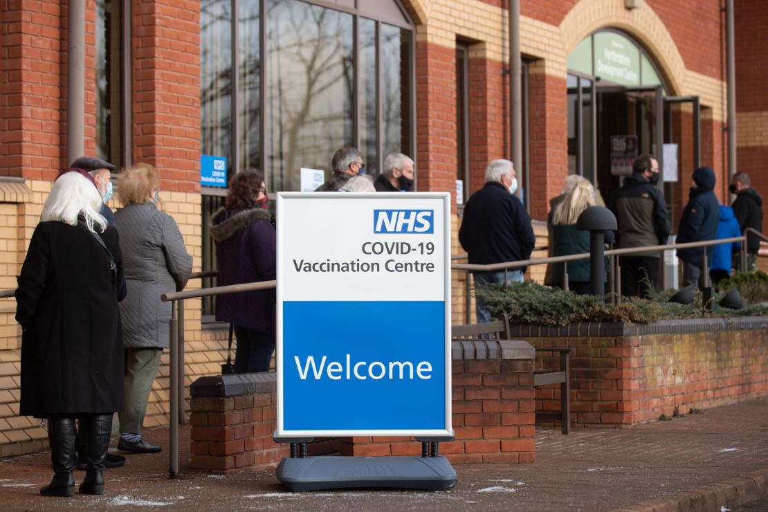 People line up outside a Covid-19 vaccination center in Stevenage, in central England, on January 11.