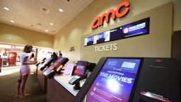 A guest buys tickets on Sep 4, 2020, at the AMC Wayne 14 movie theater in New Jersey, which reopened as Covid-19 restrictions continue to ease.