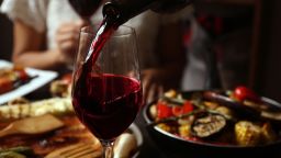 STOCK pouring wine
