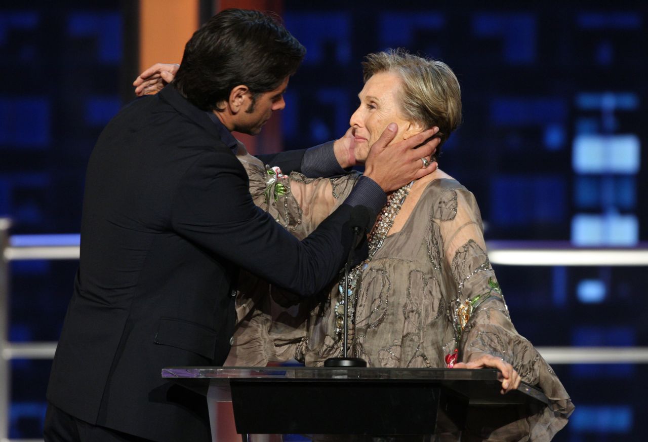 Actor John Stamos embraces Leachman at the Comedy Central roast of Bob Saget in 2008.