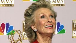 Cloris Leachman shows off her Emmy for outstanding guest actress in a comedy series for her role in "Malcom in the Middle," at the 54th Annual Primetime Emmy Awards Sunday, Sept. 22, 2002, at the Shrine Auditorium in Los Angeles. (AP Photo/Reed Saxon)