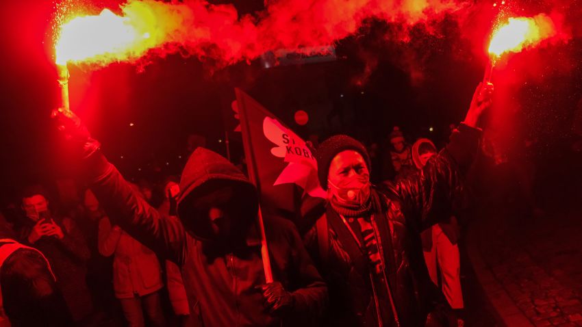 WARSAW, POLAND - JANUARY 27: Pro-choice protesters light flares during a protest on January 27, 2021 in Warsaw, Poland. A Constitutional Court ruling in October determined that abortions are only legal in cases of rape and incest, and when the mother's life is in danger, but the decision had not yet been officially published until now, three months after the ruling sparked widespread protests. (Photo by Omar Marques/Getty Images)