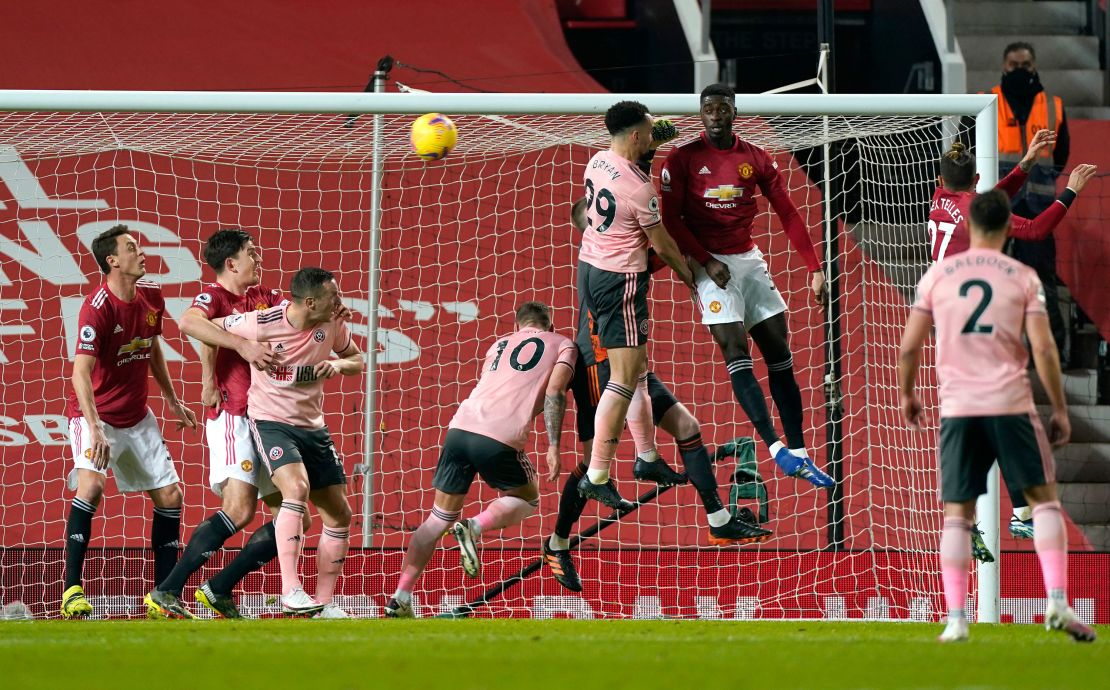 Bryan scores Sheffield United's first goal against Manchester United.