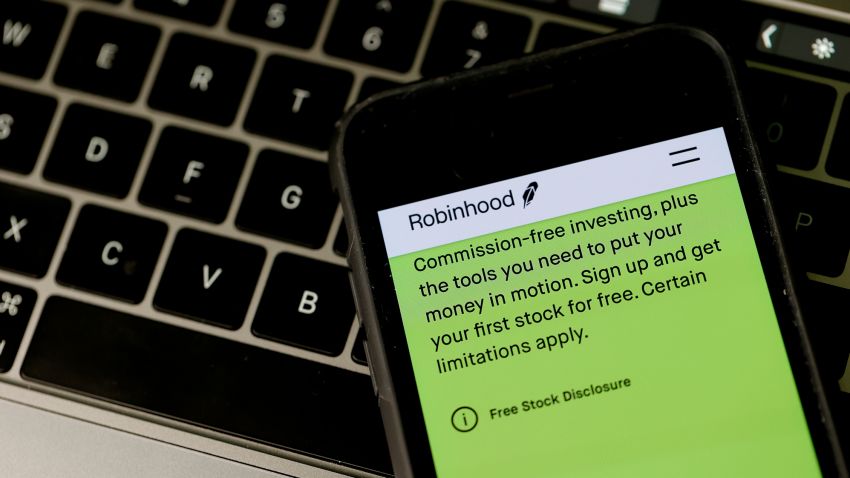 In this photo illustration, a notification about commission-free trading is displayed on the Robinhood application on December 17, 2020 in San Anselmo, California. The Securities and Exchange Commission has charged Silicon Valley start-up company Robinhood with deceiving customers about how the company makes money. The company has agreed to pay a $65 million civil penalty. (Photo Illustration by Justin Sullivan/Getty Images)