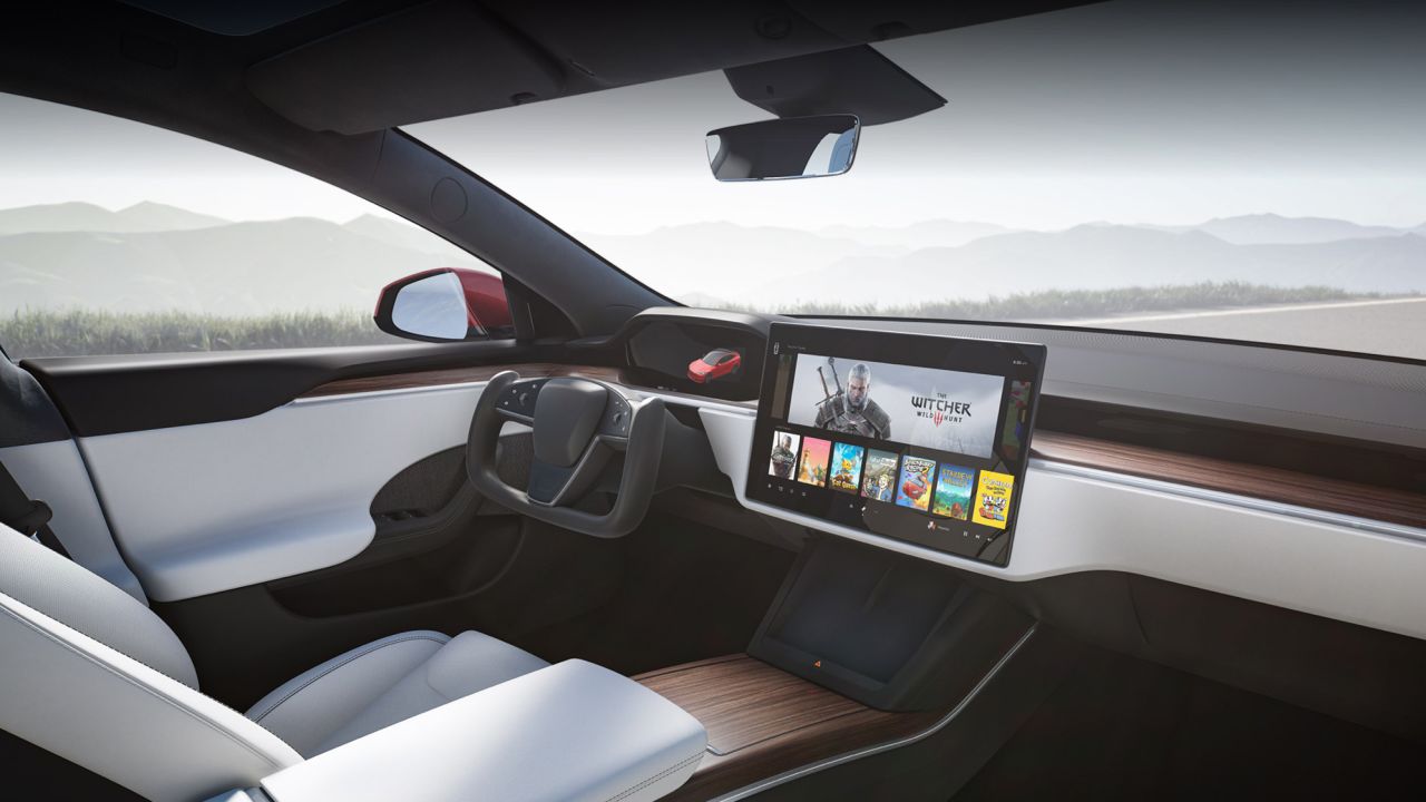 The new interior of the Model S includes a rectangular steering wheel with no stalks and a 17-inch high-definition screen in the center console. 