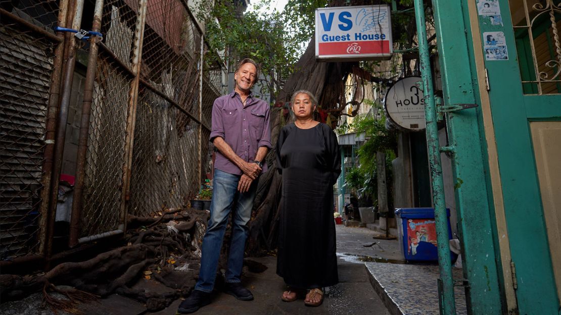 Former Lonely Planet author Joe Cummings stands with VS Guest House owner Rintipa Detkajon during a January 2021 visit.