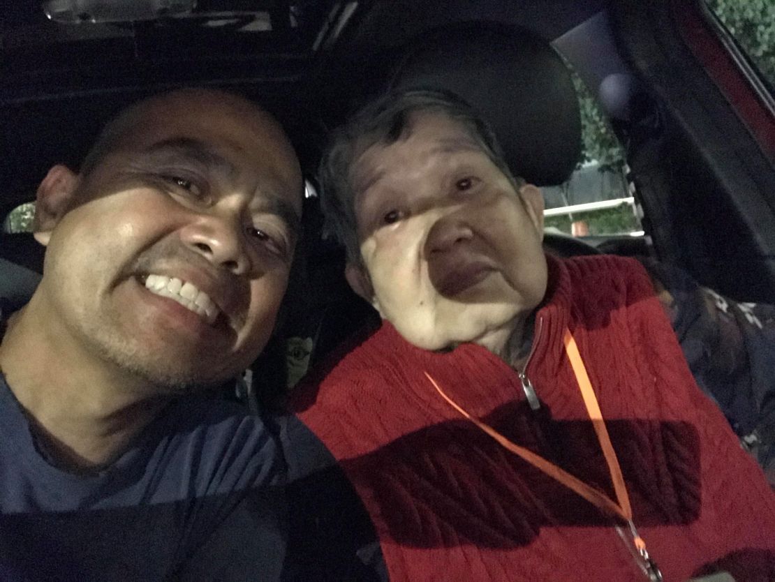 Jameson Gong and his mother, Anna, shortly after she received her negative Covid-19 test results.