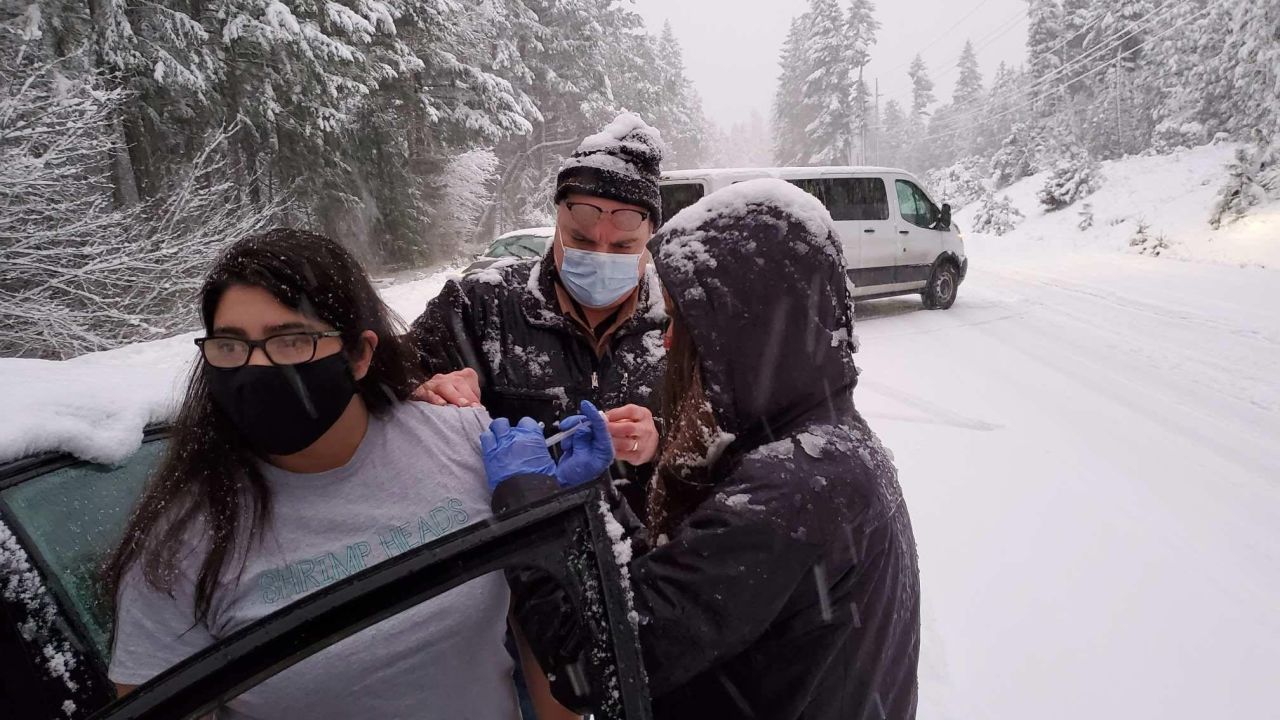 Stranded in a snowstorm in Oregon, health care workers administered leftover doses of Covid-19 vaccines to motorists stuck alongside them.