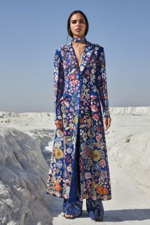 Shot in a marble dumping yard situated in Rajasthan, India, Rahul Mishra's SS21 haute couture collection symbolizes "a retrieval of color to a world drained of its natural resources," according to the show notes.