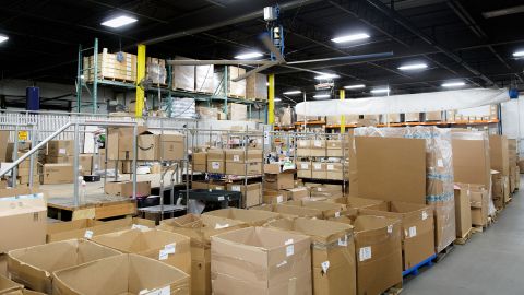 The warehouse of 888 Lots is a dizzying maze of categorized boxes called "lots". Resellers buy these lots which contain an assortment of returned products.