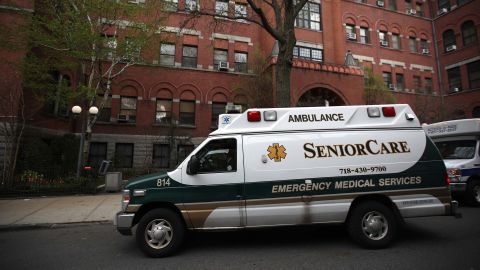 An ambulance pulls up outside the Cobble Hill Health Center on April 18, 2020, in Brooklyn, New York.