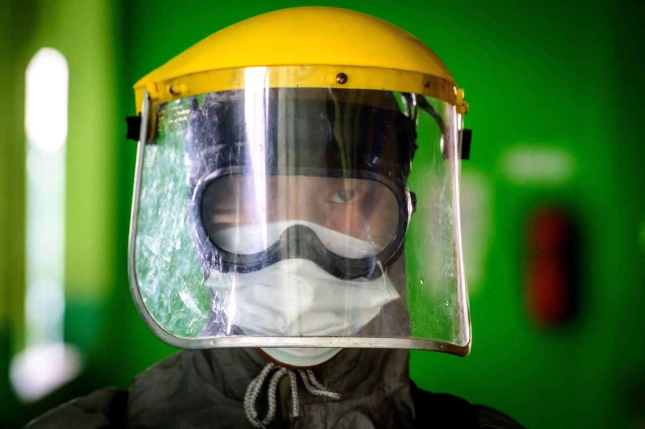 A soldier wears a face shield while disinfecting a school in Bangkok, Thailand, on Thursday, January 28.