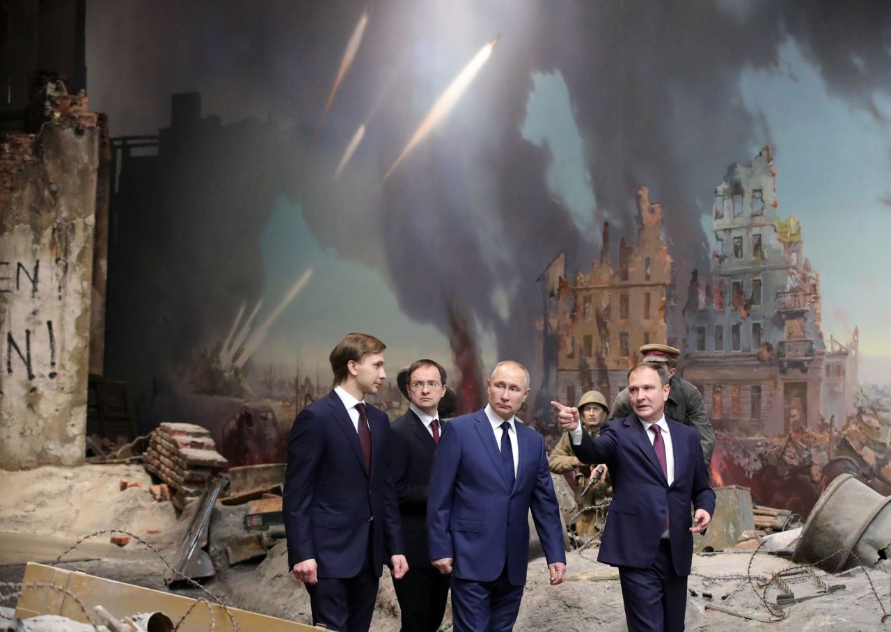 Russian President Vladimir Putin, third from left, tours the Victory Museum in Moscow on Wednesday, January 27. It was the 77th anniversary of the lifting of the Nazi siege of Leningrad during World War II.