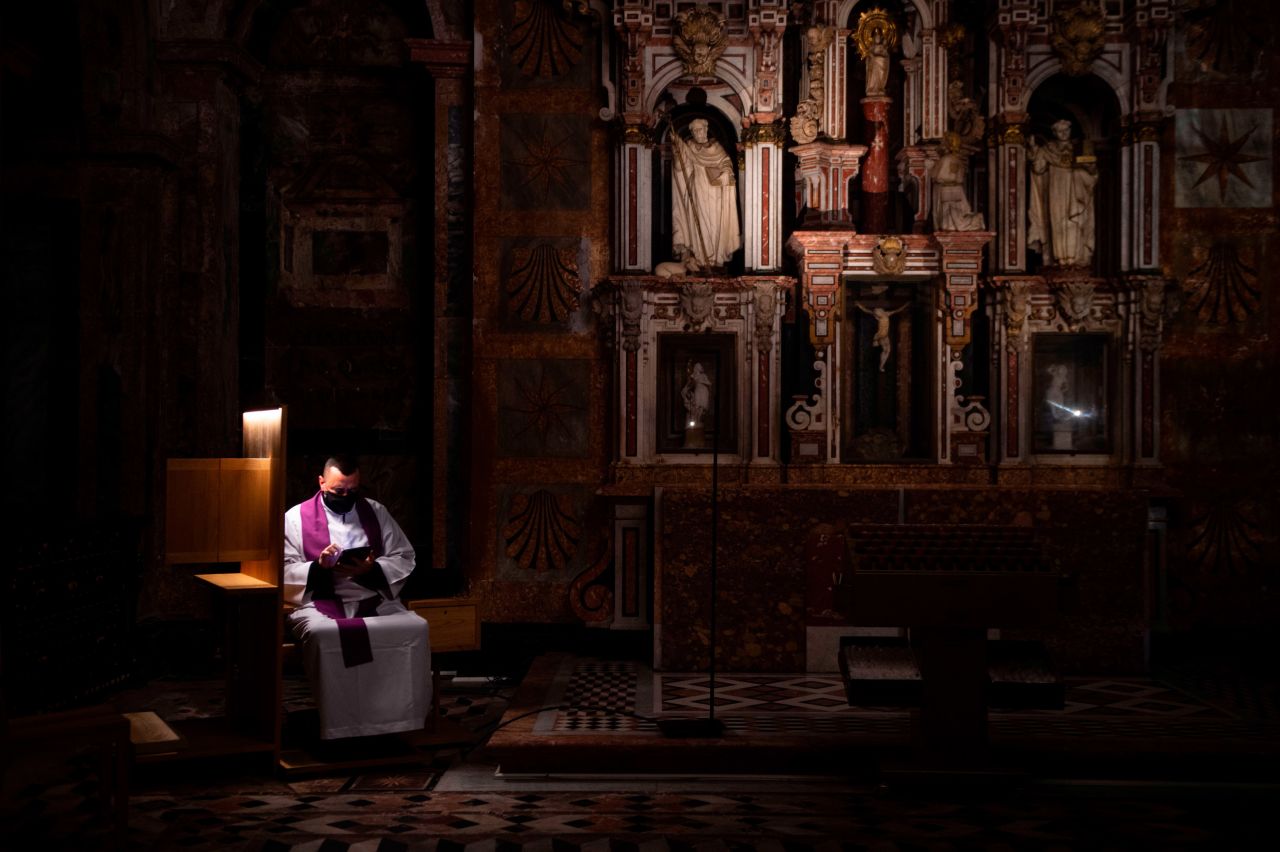 A priest waits for confessions at the Cathedral of Santiago de Compostela in Spain on Wednesday, January 27. <a href="http://www.cnn.com/2021/01/21/world/gallery/photos-this-week-january-15-january-21/index.html" target="_blank">See last week in 44 photos</a>