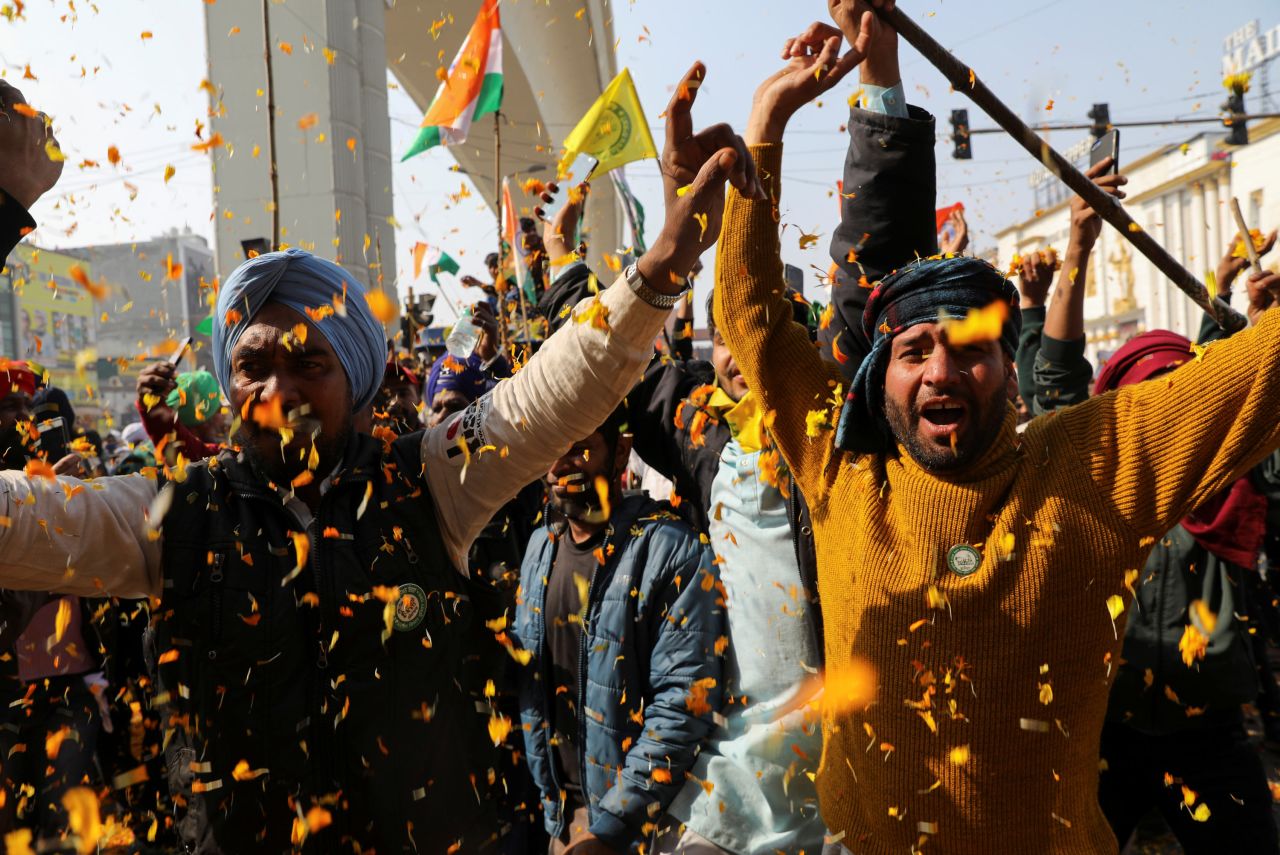Indian farmers are showered with flower petals as they head to New Delhi to protest controversial agricultural reforms on Tuesday, January 26. <a href="https://www.cnn.com/2021/01/26/asia/india-republic-day-farmers-protests-intl-hnk/index.html" target="_blank">Some protesters clashed with police</a> and scaled the walls of the historic Red Fort.
