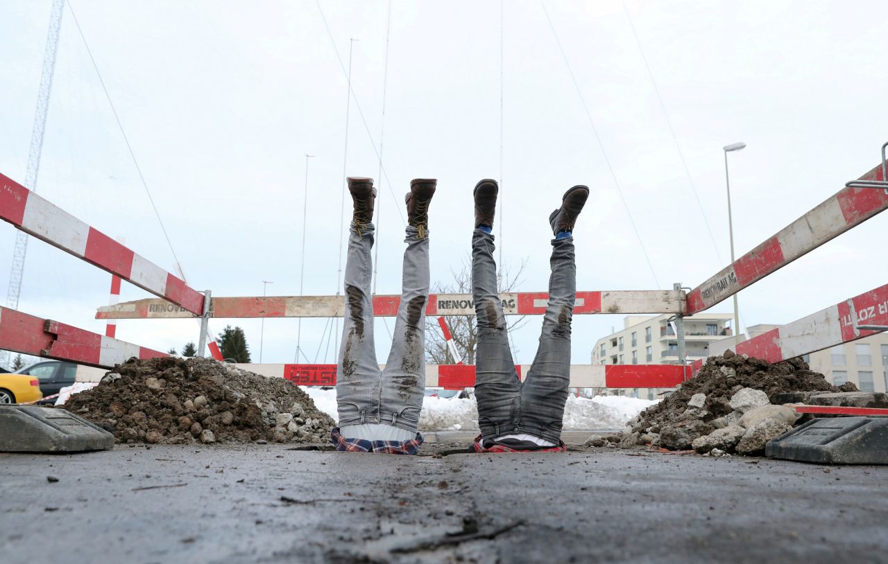 Concept artists Frank and Patrik Riklin perform in Regensdorf, Switzerland, during the presentation of their "Fondation Riklin" project on Friday, January 22.
