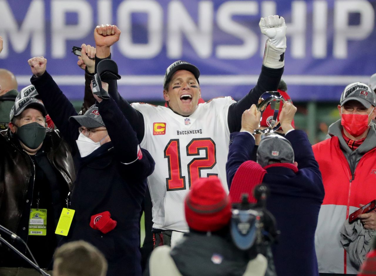 Tampa Bay quarterback <a href="http://www.cnn.com/2020/03/17/sport/gallery/tom-brady-career/index.html" target="_blank">Tom Brady</a> celebrates after his team defeated Green Bay on Sunday, January 24, to clinch a spot in the Super Bowl. This will be Brady's 10th Super Bowl appearance, which is four more than any other player in NFL history. <a href="http://www.cnn.com/2015/01/25/us/gallery/super-bowl-superlatives/index.html" target="_blank">See the greatest Super Bowl records</a>