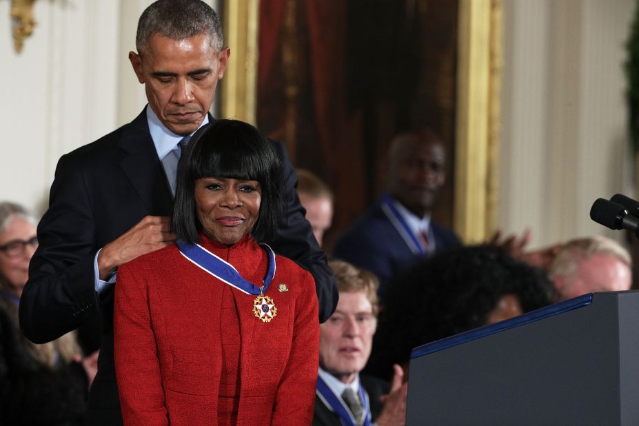 President Barack Obama presents Tyson with the Presidential Medal of Freedom in 2016.