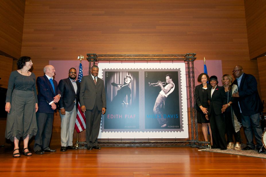 Tyson, third from right, attends an unveiling of a Miles Davis postage stamp in 2012.