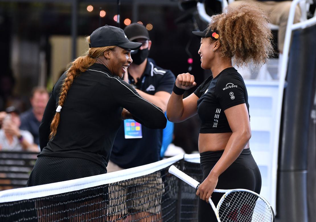 Serena Williams of the USA  elbow bumps with Naomi Osaka of Japan after their match during an exhibition tournament at Memorial Drive on January 29, 2021 in Adelaide, Australia.