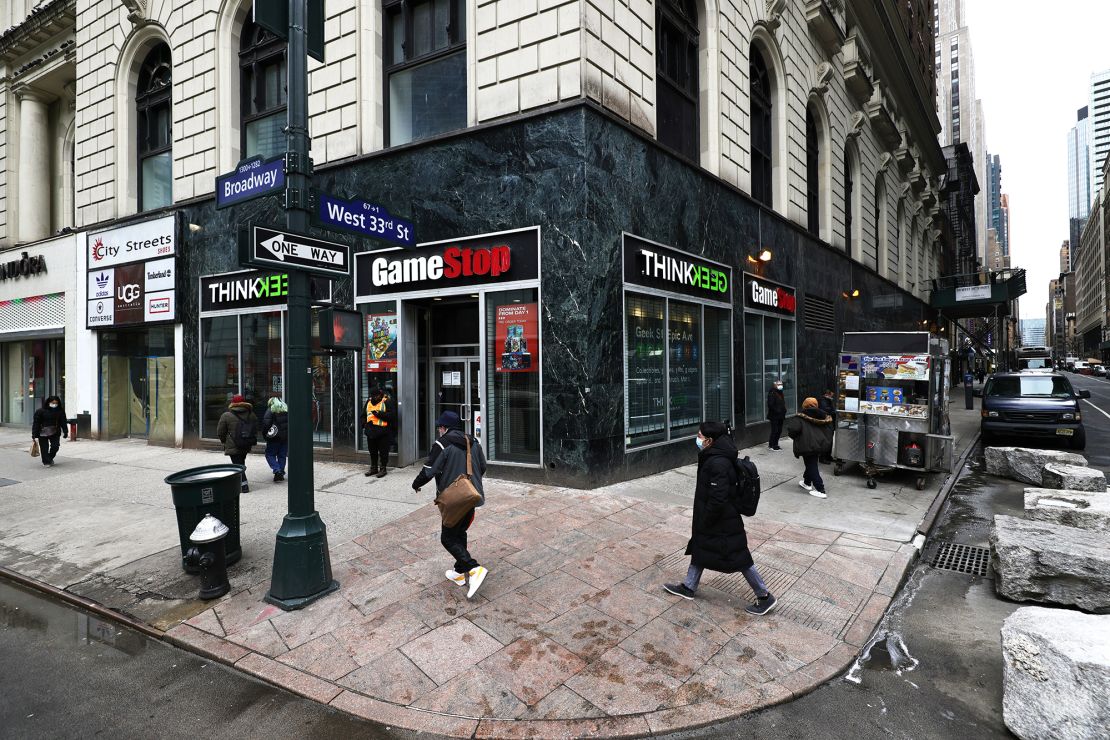 People walk past a GameStop store in Midtown Manhattan on Jan. 27.