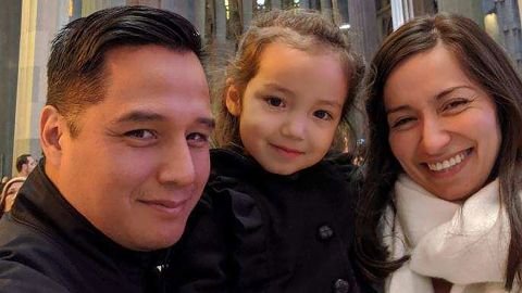 Juan and Diana Ordonez hold their daughter, Mia.