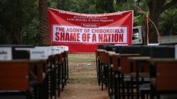 Names of the remaining Chibok schoolgirls are displayed with their desk on April 14, 2019, during the 5th Year Commemoration of the abduction of the 276 Chibok Schoolgirls by Boko Haram on April 14, 2014 from Government Secondary School, Chibok, Borno State. - On April 14, 2014, gunmen stormed the Chibok girls' boarding school, kidnapping 276 pupils aged 12-17, 57 of whom managed to escape by jumping from the trucks. After negotiations with Boko Haram, 107 of the girls either escaped, were released in exchange for prisoners or were recovered by the army. 112 Chibok girls are still missing. (Photo by Kola SULAIMON / AFP)        (Photo credit should read KOLA SULAIMON/AFP via Getty Images)