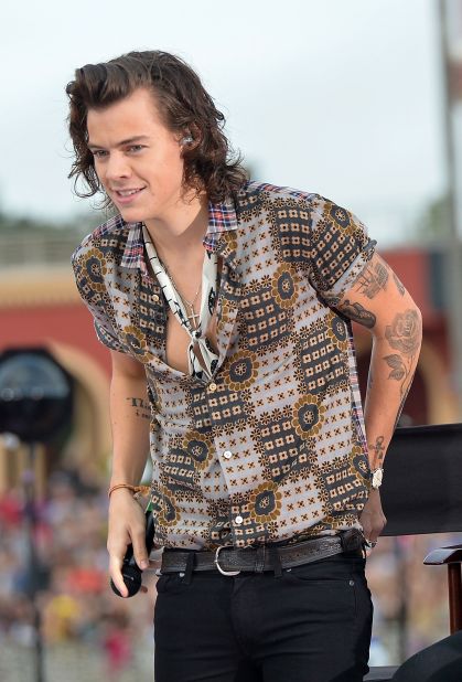 Styles performing at NBC's Today show in 2014, wearing a Marc by Marc shirt and accessorized with an Alexander McQueen neckerchief. 