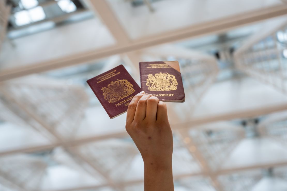 A pro-democracy protester holds a British passport during a rally on June 1, 2020 in Hong Kong.