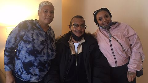 Michael Thompson with his two daughters, Rashawnda Littles, left, and Princess Thompson.