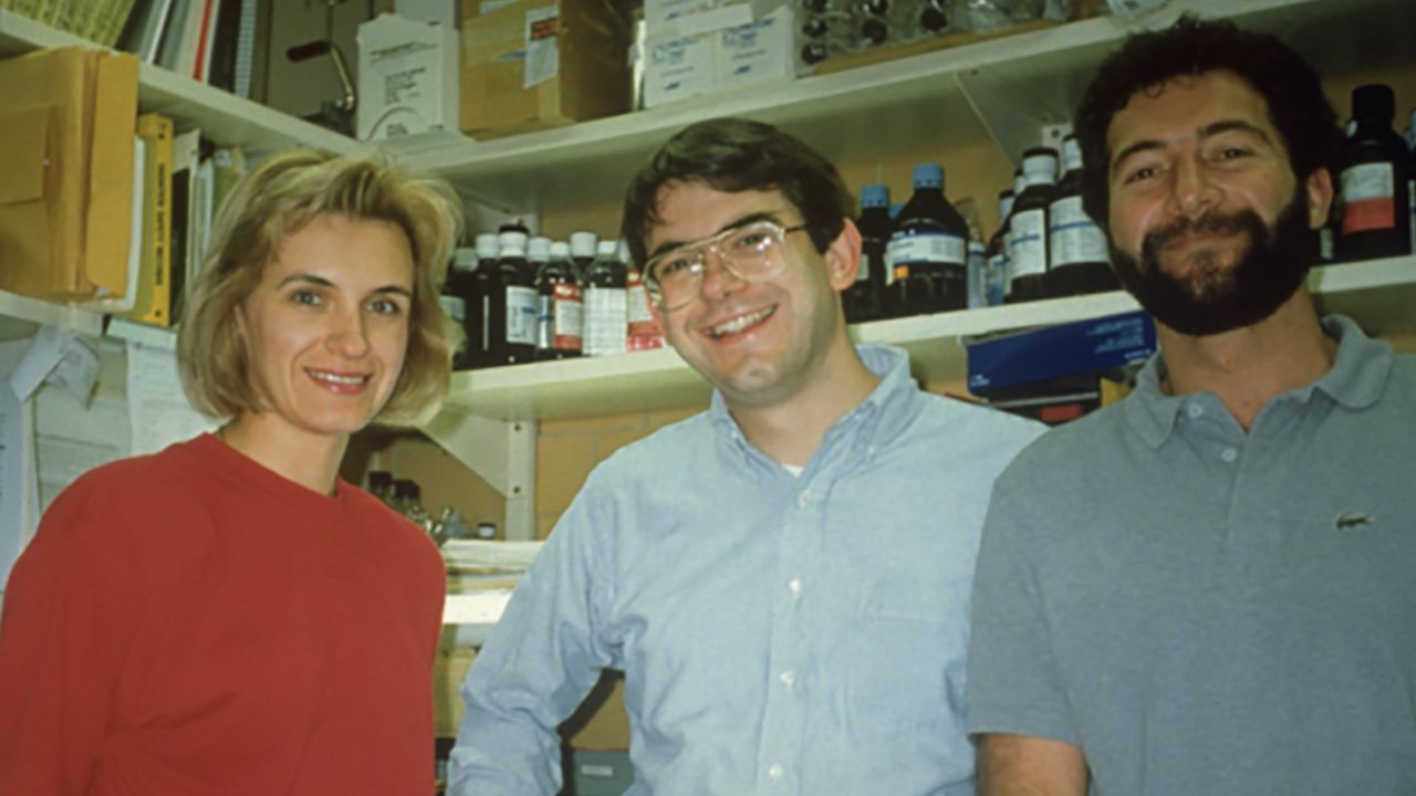 Dr. Dan Kastner (center) is shown in his NIH lab in 1990 with his colleagues Dr. Ivona Aksentijevich and Dr. Luis Gruberg.