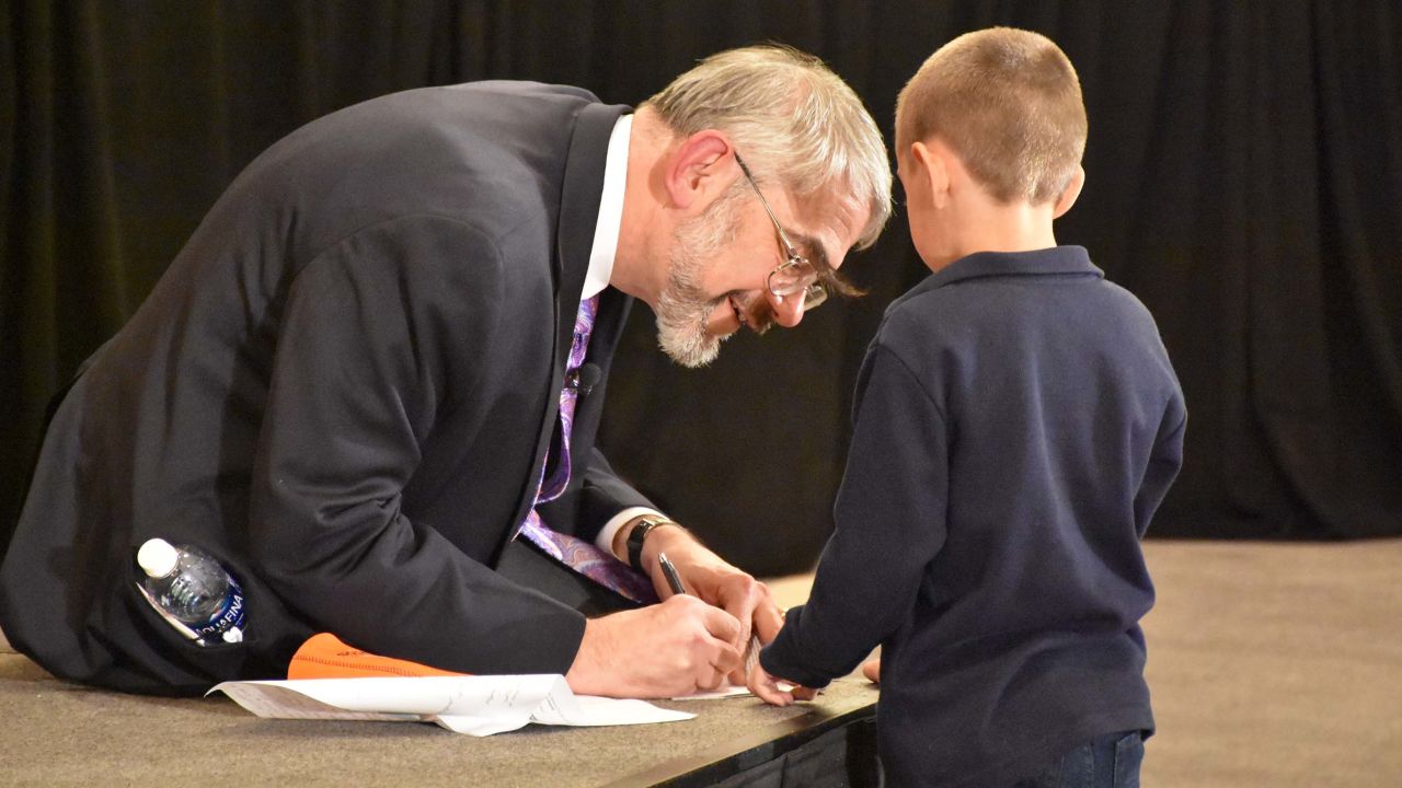Kastner is shown in 2016 at the inaugural DADA2 conference in Bethesda, Maryland, with a boy who has DADA2, an autoinflammatory disorder. The award-winning scientist identified the genetic mutation that causes the disease and also helped develop treatments.