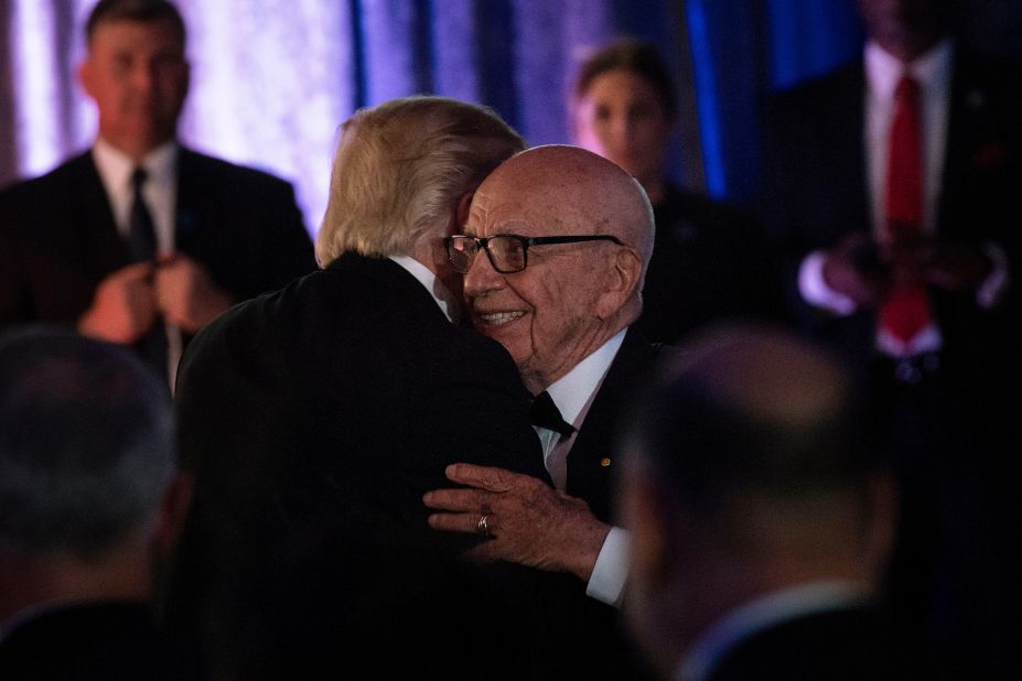 Murdoch embraces US President Donald Trump at an event in New York in 2017.