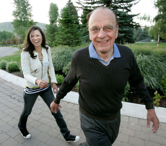 Murdoch and his third wife, Wendi Deng, arrive for a media conference in Idaho in 2008. They were married from 1999 to 2013 and had two daughters together.