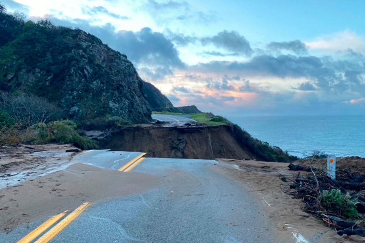 In this photo provided by Caltrans, a section of Highway 1 is shown collapsed.