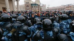 People clash with police during a protest against the jailing of opposition leader Alexei Navalny in Moscow, Russia, Sunday, Jan. 31, 2021. Thousands of people took to the streets Sunday across Russia to demand the release of jailed opposition leader Alexei Navalny, keeping up the wave of nationwide protests that have rattled the Kremlin. Hundreds were detained by police. (AP Photo/Alexander Zemlianichenko)
