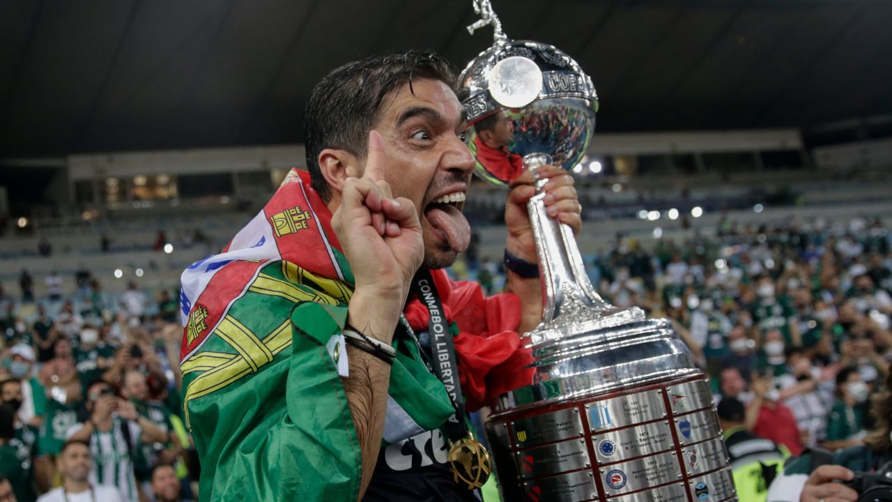 Palmeiras' coach Abel Ferreira celebrates with the trophy after winning the Copa Libertadores. 