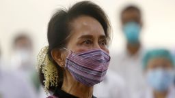 Myanmar leader Aung San Suu Kyi watches the vaccination of health workers at hospital Wednesday, Jan. 27, 2021, in Naypyitaw, Myanmar. Health workers in Myanmar on Wednesday became the country's first people to get vaccinated against COVID-19, just five days after the first vaccine supply was delivered from India. (AP Photo/Aung Shine Oo)