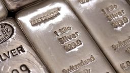 The hallmark details on one kilogram silver bars are seen at London bullion dealers Gold Investments Ltd. in this arranged photograph in London, U.K., on Thursday, April 4, 2013. Gold traders are split on whether bullion will plunge into its first bear market since 2008 as economies improve or rally as central banks buy more debt. Photographer: Simon Dawson/Bloomberg via Getty Images