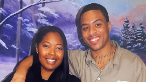 Brittany Barnett meets with Young, her client, in this undated photo from his time in prison.