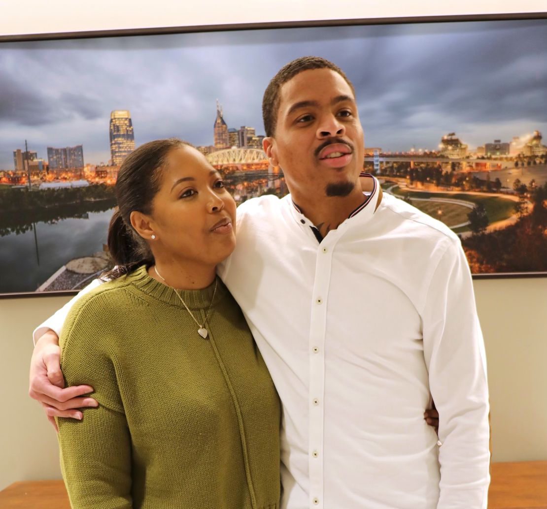 Barnett and Young embrace after his release from prison last month.