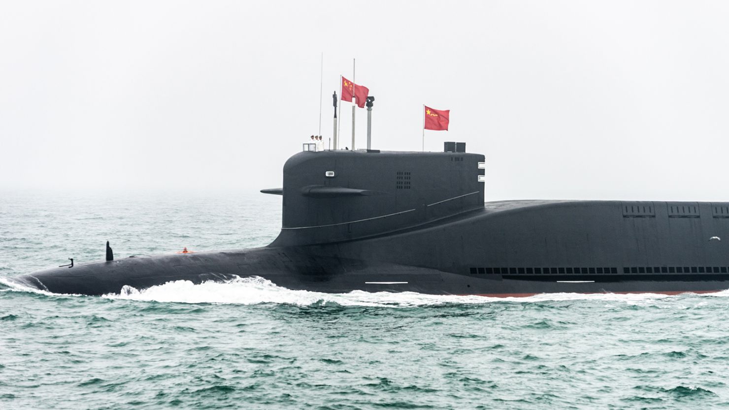 A Chinese ballistic missile submarine takes part in a military parade in the Yellow Sea in 2019.