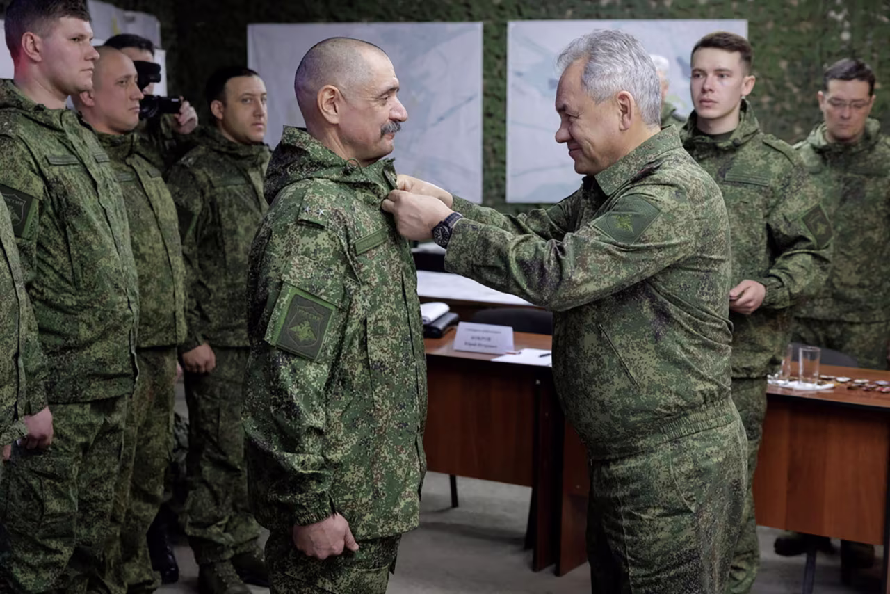 Russian Defense Minister Sergei Shoigu awards service members deployed in Ukraine, in this handout image published March 4. 
