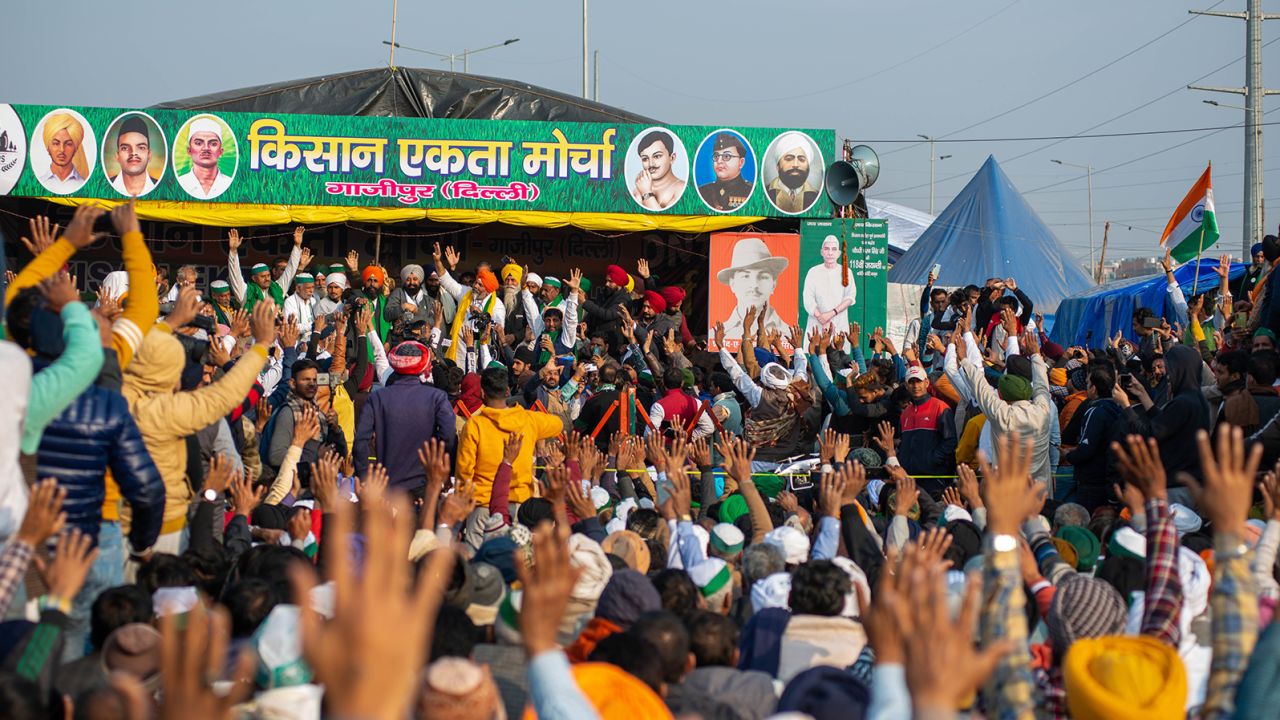 Farmers listen to speeches at the camps. We didn't see too many masks.