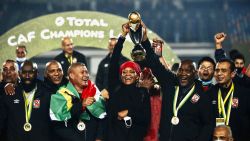 South African Pitso Mosimane celebrates with his team winning 2-1 over Zamalek in the CAF Champions League final played at the Cairo International Stadium on November 27, 2020.