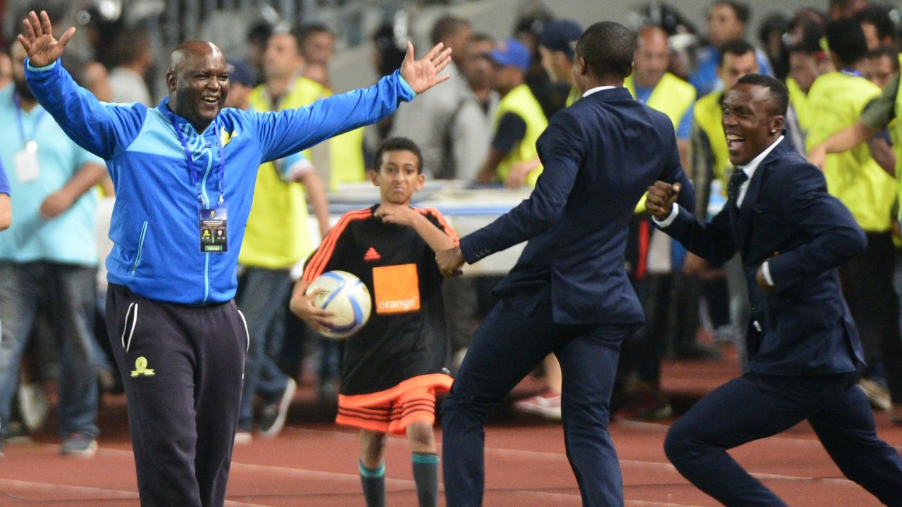 Sundowns' coach Pitso Mosimane reacts after winning the CAF Champions League following the final between Zamalek and Mamelodi Sundowns on October 23, 2016 at the Borg el-Arab Stadium near Alexandria.